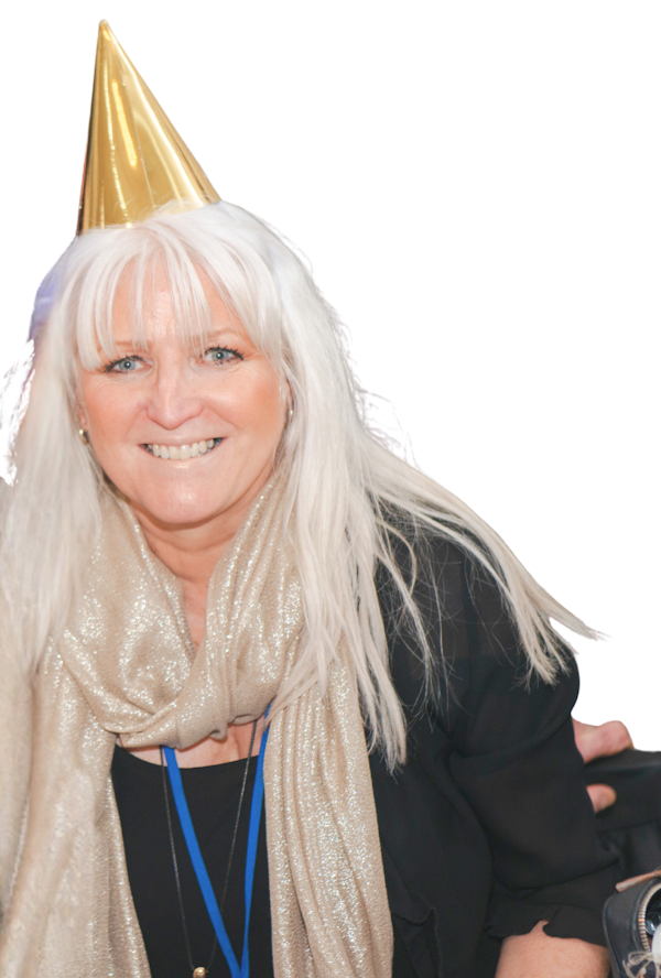 Picture of Michelle wearing a party hat taken at the members 160th celebration party.